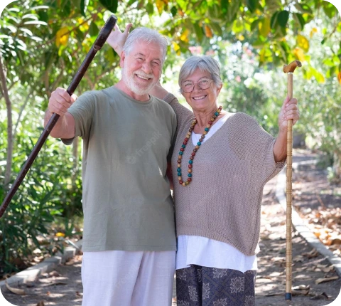 happy older couple on a walk in nature